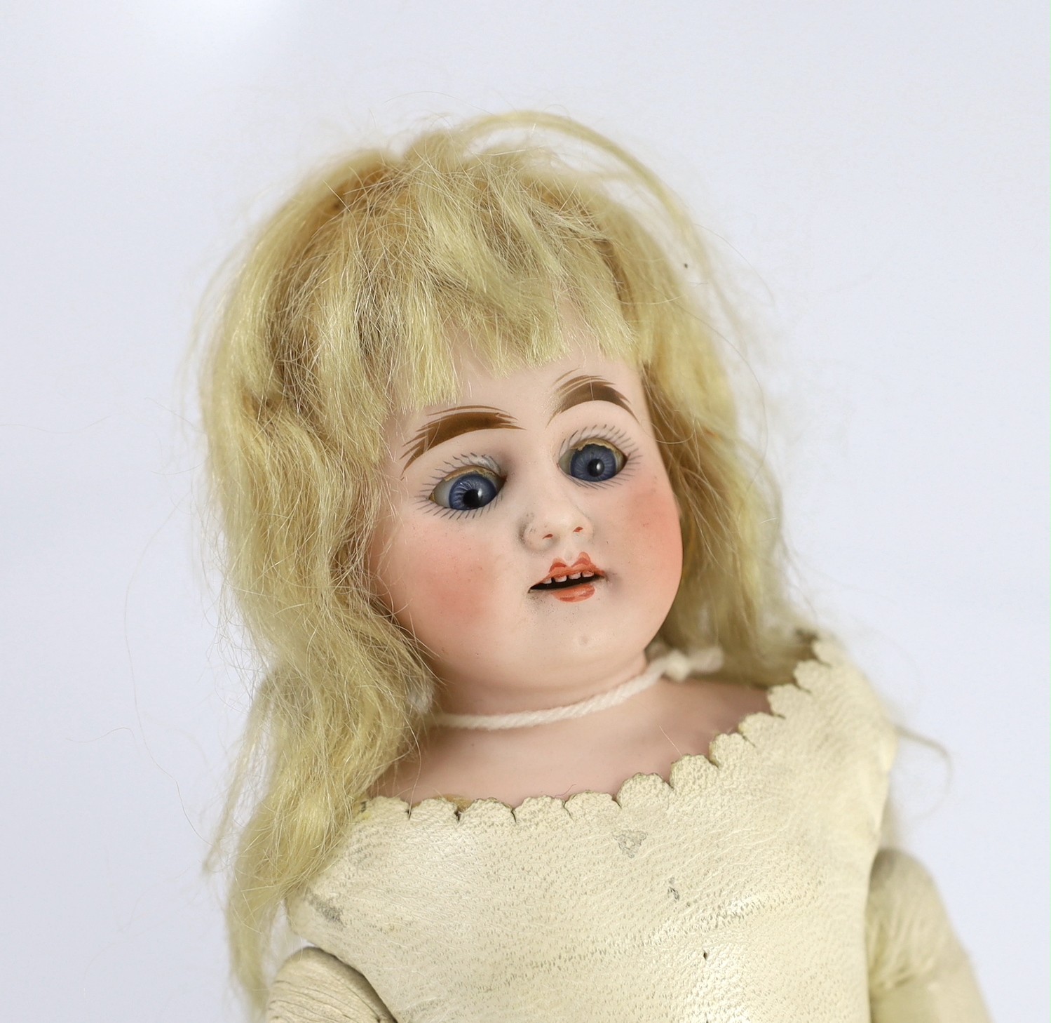 An Armand Marseille shoulder-bisque doll, German, circa 1896, 14in.